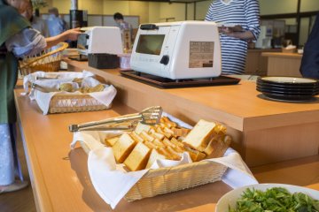 <p>Breakfast spread of various breads available</p>