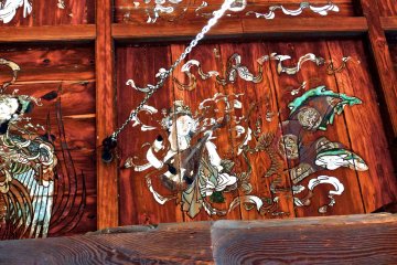 <p>Vault painting and chains that the bell hangs from</p>