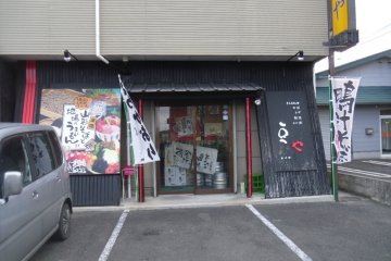 <p>There are a lot of signs outside the restaurant, which is otherwise quite subdued with its decoration.</p>
