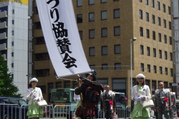<p>Later, the parade grows and takes to the road, with the dignitaries back in the lead. It lasts for over three hours.</p>