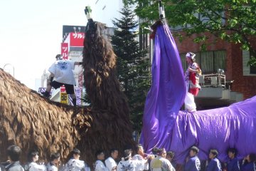 <p>Miyajima shrine had this offering for the parade. The two behemoths were carried by a team of people each, and could lower their heads over a surprised crowd!</p>