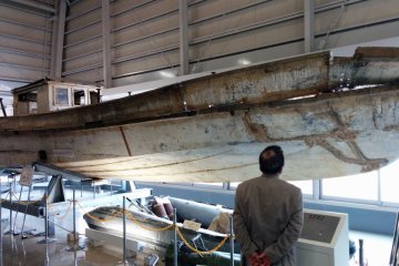 <p>A smaller boat in the back of the warehouse actually hid inside the larger one.&nbsp;</p>