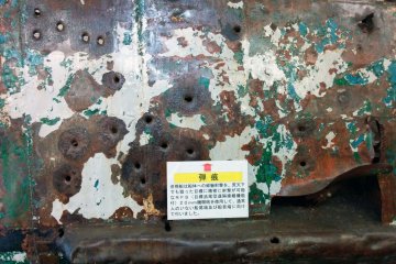 <p>Bullet holes retell the skirmish on the open sea.</p>