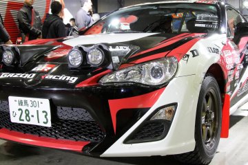 There's quite a lot of racing and souped up cars ready to race in their team's colors and sporting the companies' sponsorship stickers on them.&nbsp;