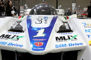 This super race car looked very impressive in real life, with super sleek body lines and a million of sponsorship stickers on it.&nbsp;