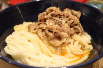 <p>Udon with raw eggs and beef</p>