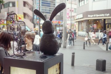 <p>The rabbit statue watching the street</p>