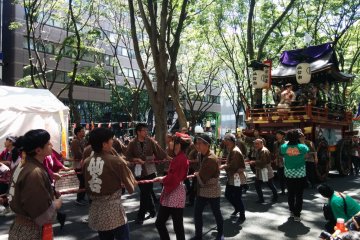 Citizens pull with a little extra effort because this float holds the mayor of the city.&nbsp;