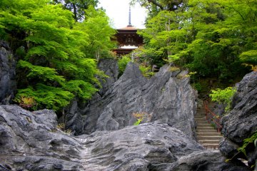 Steps between strange rocks lead to Ishiyama-dera's elegant 12th century pagoda