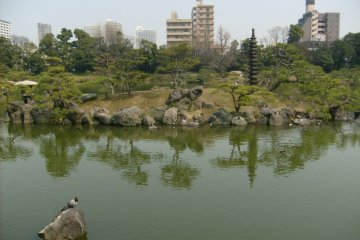 <p>Matsushima island in the pond has a distinctive tall pagoda</p>