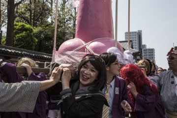 Men in drag carried the pink penis mikoshi