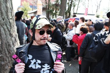 A man giving out free condoms