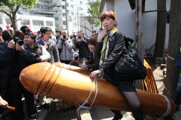 Nude model Kaho on a phallus