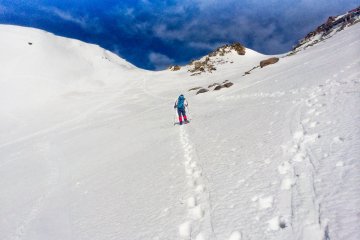 <p>Climbing 'over-the-ridge' to reach the peak</p>