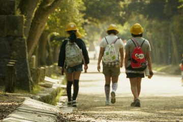 <p>Schoolgirls enjoy coming back home through Nara&nbsp;park.&nbsp;</p>