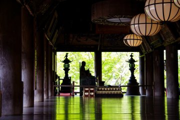 <p>Small seated stature inside the main worship hall</p>