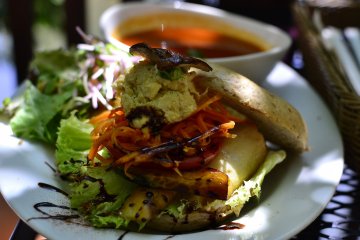 The bagel with creamy beans paste comes with soup of the day and a fresh salad