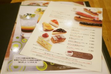 <p>A menu full of cakes.</p>