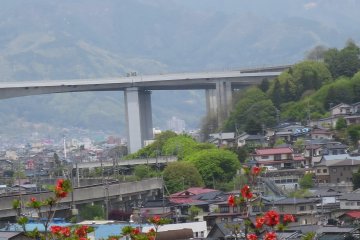 <p>The top of Mt. Fuji can be seen from the top of the hill at Tsurumine Park.</p>