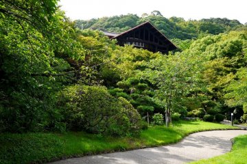 <p>One of the villa's gables rises from the trees.</p>