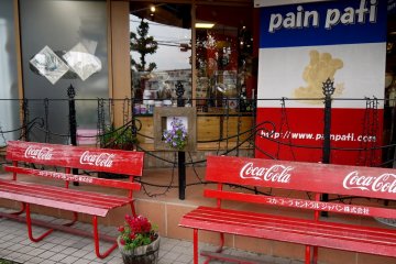 <p>If the tables are full you can use one of these red benches</p>
