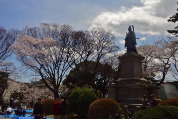 There is a big statue standing in the park. It is of Ii Naosuke who was a high-ranking samurai at the end of the Tokugawa Shogunate.