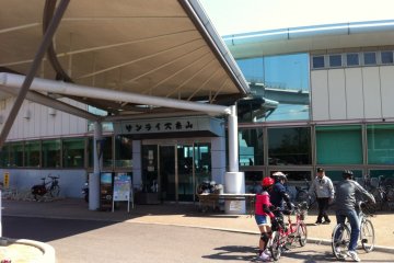 A family returns their rental bikes
