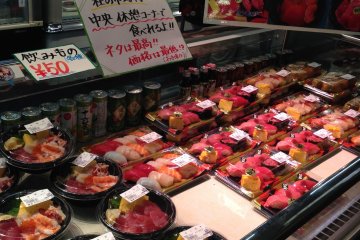 <p>Sushi shop from Taneichi&nbsp;says "Try our Sushi, the best quality at a reasonable price"</p>