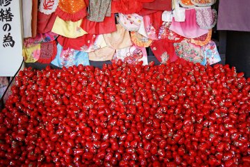 <p>Daruma dolls, each containing a wish, are left at the temple</p>