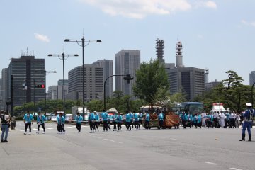 <p>The parade heads towards Tokyo Station</p>