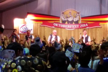 <p>Inside the beer hall, a giant tent, the band rocks the crowd!</p>