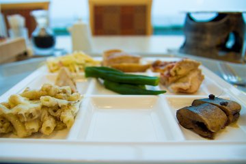 <p>Plates with individual sections mean you can try a host of foods at the same time</p>