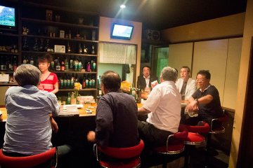 <p>Enjoy a drink and karaoke in the local Snack bar</p>