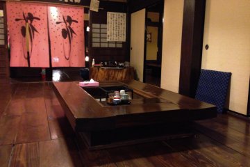 <p>Dining room with sunken hearth</p>