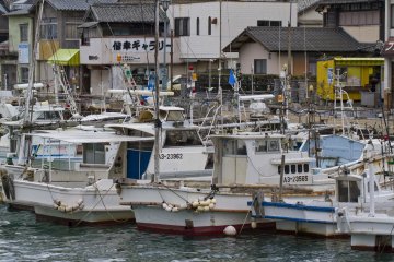 <p>The harbor is packed with interesting fishing vessels to explore from the town streets</p>