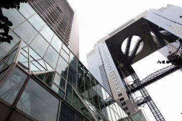 Looking up at the Westin Osaka and Umeda Sky Building from the ground