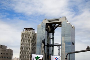 <p>Umeda Sky Building and the Westin Hotel Osaka under the blue sky</p>