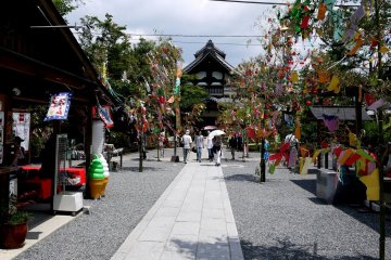 <p>The path to the temple looks very festive flanked by the decorated bamboo branches</p>