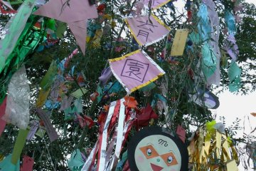 <p>The decorations include paper chains, stars, and faces</p>
