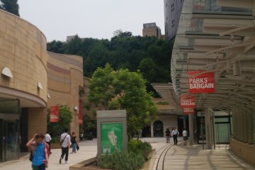 <p>Namba Parks starts here. Yamada Denki&nbsp;is a bit more ahead. Continue to walk straight</p>