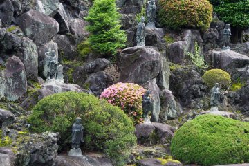 <p>Statues amidst the rocks</p>