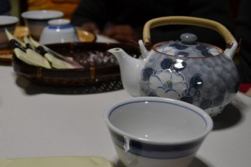 Hot tea and local snacks to warm us up