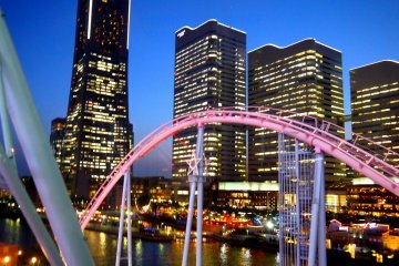 <p>Pink arch of the rollercoaster at Cosmo World</p>