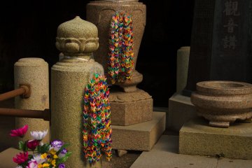 <p>Senbazuru (千羽鶴), or a thousand origami cranes, are used as a symbol of good luck and a prayer for peace and good fortune</p>