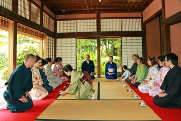 <p>Lined up in rows, trying seiza seating style</p>