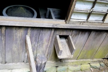 <p>I think this wooden chute was for draining waste water from the kitchen</p>