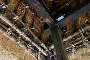 <p>If you look under the eaves you can get an idea of how the thatch roof is made</p>