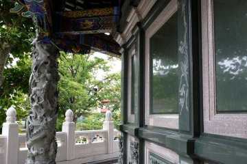 Dragons writhe around the verandah columns