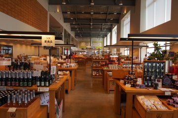 <p>Lines of local market produce inside the A-Factory</p>