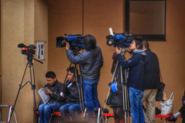 <p>TV crews and news studios arrive and set up ready for the ceremony to begin</p>